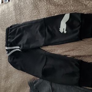Boys black Puma sweatpants size M